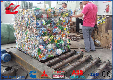 手動タイの供給を用いる37kw横のプラスチック フィルム/紙くずの梱包機